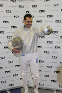 Photo of Rich Herrera who brought his sons to fence and took up the sword himself